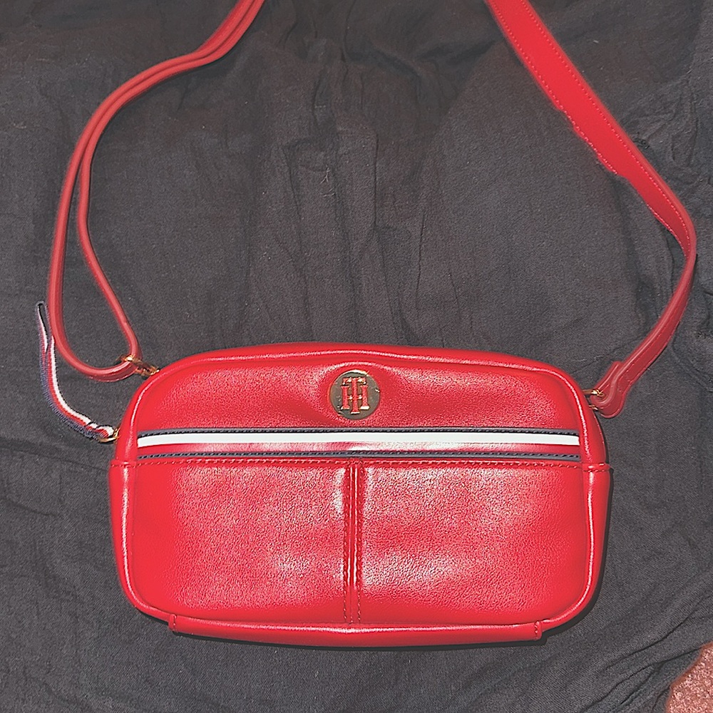 Red Tommy Hilfiger bag. It has been barely used, and is in good condition.